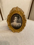 Bronze frame with gilt filigree