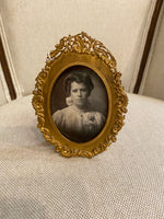 Bronze frame with gilt filigree