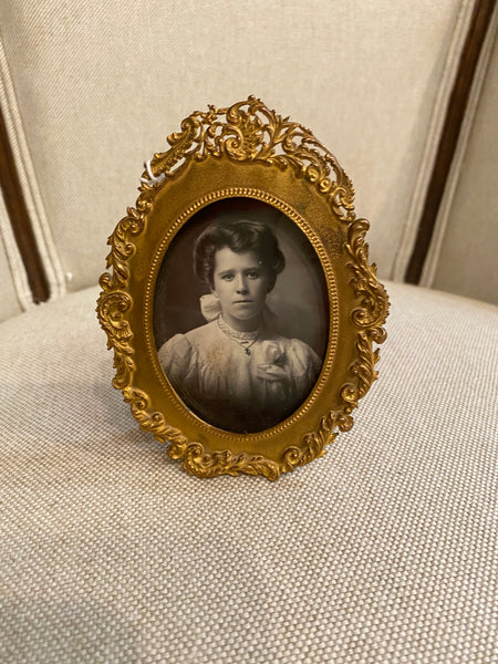 Bronze frame with gilt filigree